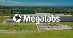 Megalabs logo with the factory in the background
